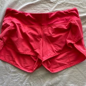 Hot pink running shorts